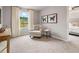 Inviting bedroom with a comfortable armchair, soft carpet, and serene atmosphere at 5615 Hislop Ln # 82, Mableton, GA 30126