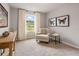 Bedroom featuring soft lighting, neutral colors, comfortable chair and decor at 5615 Hislop Ln # 82, Mableton, GA 30126