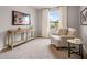 Bedroom featuring soft lighting, neutral colors and a cozy armchair at 5615 Hislop Ln # 82, Mableton, GA 30126