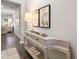 Inviting hallway with stylish console table, decorative lamps, and wood-look flooring at 5615 Hislop Ln # 82, Mableton, GA 30126