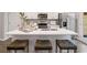 Bright kitchen featuring stainless steel appliances, a large island with barstool seating at 5615 Hislop Ln # 82, Mableton, GA 30126