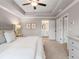 Spacious main bedroom with tray ceiling, neutral color palette, and ensuite bathroom access at 5615 Hislop Ln # 82, Mableton, GA 30126