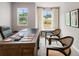 Dedicated office space with natural light and stylish furniture perfect for working from home at 5615 Hislop Ln # 82, Mableton, GA 30126