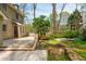 Expansive backyard featuring a spacious patio, deck, and lush garden at 6795 Brandon Mill Rd, Atlanta, GA 30328