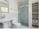 Modern bathroom featuring a glass-enclosed shower and built in shelving at 6795 Brandon Mill Rd, Atlanta, GA 30328