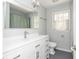Bathroom with a white vanity, white toilet, and a bathtub/shower combo at 6795 Brandon Mill Rd, Atlanta, GA 30328