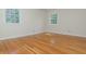 Bedroom with hardwood floors, neutral paint, and windows for lots of light at 6795 Brandon Mill Rd, Atlanta, GA 30328