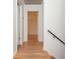 Bright hallway with hardwood floors leading to another room at 6795 Brandon Mill Rd, Atlanta, GA 30328