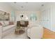 Bright home office with hardwood floors, neutral paint, lots of light and comfortable seating at 6795 Brandon Mill Rd, Atlanta, GA 30328