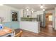Bright kitchen with white countertops, stainless steel appliances, and a view to an adjacent room at 6795 Brandon Mill Rd, Atlanta, GA 30328