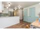 Spacious kitchen with stainless steel appliances, and light green tile backsplash at 6795 Brandon Mill Rd, Atlanta, GA 30328