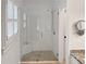 Modern bathroom with a frameless glass shower and tile flooring at 8675 Hope Vine, Roswell, GA 30076