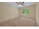 Bedroom with neutral paint, window with wooded views and carpeted floors at 8675 Hope Vine, Roswell, GA 30076