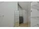 Walk in closet featuring built in shelving, wood floors, and a full length mirror at 8675 Hope Vine, Roswell, GA 30076
