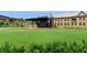 Expansive lawn with a covered stage area, perfect for community events or outdoor gatherings in a serene, green setting at 8675 Hope Vine, Roswell, GA 30076
