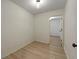 Room with wood laminate flooring, neutral walls and modern lighting at 8675 Hope Vine, Roswell, GA 30076