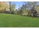 Expansive backyard with lush green grass, mature trees and privacy providing full perimeter growth at 2378 Green Forrest Dr, Decatur, GA 30032