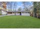 Charming single-story home with a neatly manicured lawn and classic brick accents at 2378 Green Forrest Dr, Decatur, GA 30032