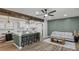 Open-concept kitchen and living area featuring a large island with seating and modern finishes with eat in table at 2378 Green Forrest Dr, Decatur, GA 30032