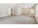 Spacious primary bedroom with a tray ceiling, carpet, and neutral color palette at 2896 Chilhowee Dr, Atlanta, GA 30331