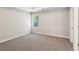 Bedroom with carpet, light gray walls, and a bright window at 2896 Chilhowee Dr, Atlanta, GA 30331