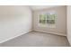 Inviting bedroom featuring soft carpet and natural light at 2896 Chilhowee Dr, Atlanta, GA 30331