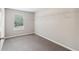 Spacious bedroom with neutral carpet and built-in closet shelving at 2896 Chilhowee Dr, Atlanta, GA 30331