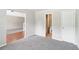 Cozy bedroom with carpet, neutral paint, and bathroom access, ideal for comfortable living at 2896 Chilhowee Dr, Atlanta, GA 30331
