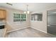 Eat-in kitchen dining area with view into living room at 2896 Chilhowee Dr, Atlanta, GA 30331