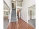 Spacious foyer featuring a staircase and a view into the living room, with neutral walls and flooring at 2896 Chilhowee Dr, Atlanta, GA 30331