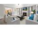 Cozy living room with fireplace, neutral-toned walls and furnishings, and open access to the kitchen at 2896 Chilhowee Dr, Atlanta, GA 30331