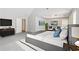 Main bedroom suite with tray ceiling, sitting area, and modern furniture provides relaxation at 2896 Chilhowee Dr, Atlanta, GA 30331
