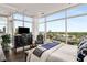 Bright bedroom featuring floor-to-ceiling windows with a cityscape view at 45 Ivan Allen Jr Nw Blvd # 2705, Atlanta, GA 30308