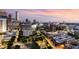 Scenic sunset view of the buildings and trees of the city at 45 Ivan Allen Jr Nw Blvd # 2705, Atlanta, GA 30308