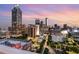 Night view of city buildings with decorative outdoor lights at 45 Ivan Allen Jr Nw Blvd # 2705, Atlanta, GA 30308