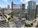 Modern glass skyscraper featuring a rooftop pool deck, set against the backdrop of the city skyline at 45 Ivan Allen Jr Nw Blvd # 2705, Atlanta, GA 30308