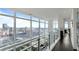 Hallway featuring floor-to-ceiling windows and breathtaking views of the city at 45 Ivan Allen Jr Nw Blvd # 2705, Atlanta, GA 30308