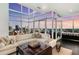 Modern living room showcasing floor-to-ceiling windows with stunning city views at 45 Ivan Allen Jr Nw Blvd # 2705, Atlanta, GA 30308
