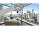 Bright living room with floor-to-ceiling windows and a stunning city view at 45 Ivan Allen Jr Nw Blvd # 2705, Atlanta, GA 30308