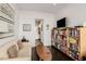 Cozy living room with built-in bookshelves and a TV, perfect for relaxing and unwinding at 45 Ivan Allen Jr Nw Blvd # 2705, Atlanta, GA 30308
