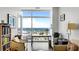 Bright office area with a large window providing abundant natural light and offering great city views at 45 Ivan Allen Jr Nw Blvd # 2705, Atlanta, GA 30308