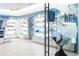 Bright retail space with beauty products displayed on shelves at 45 Ivan Allen Jr Nw Blvd # 2705, Atlanta, GA 30308