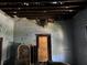Room interior needing repair with damaged walls, paint, and window at 592 Formwalt Sw St, Atlanta, GA 30312