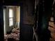 Damaged room featuring exposed ceiling and walls needing renovation at 592 Formwalt Sw St, Atlanta, GA 30312