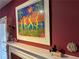 Elegant fireplace mantle adorned with tasteful artwork and decorative items at 672 Mcgill Ne Pl # 672, Atlanta, GA 30312