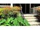 Townhouse entrance with garden and stairs leading to the front door at 672 Mcgill Ne Pl # 672, Atlanta, GA 30312
