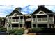 Exterior shot showcasing multi-level architecture with cozy balconies and green landscaping at 672 Mcgill Ne Pl # 672, Atlanta, GA 30312