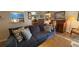 Cozy living room with comfortable seating, hardwood floors, and open floor plan at 672 Mcgill Ne Pl # 672, Atlanta, GA 30312