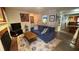 Comfortable living room features a plush sofa, inviting fireplace, and hardwood flooring for an elegant yet homey touch at 672 Mcgill Ne Pl # 672, Atlanta, GA 30312