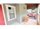 Covered patio area with outdoor seating and a view of the yard at 672 Mcgill Ne Pl # 672, Atlanta, GA 30312
